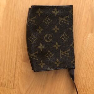 Vintage Louis Vuitton cosmetic case.  5.75 x 4 x 1.25